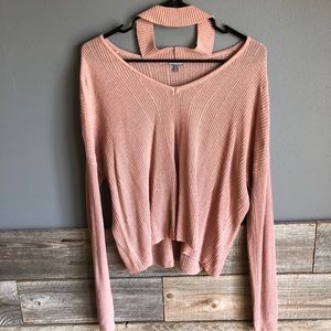 Pink sweater with choker neck